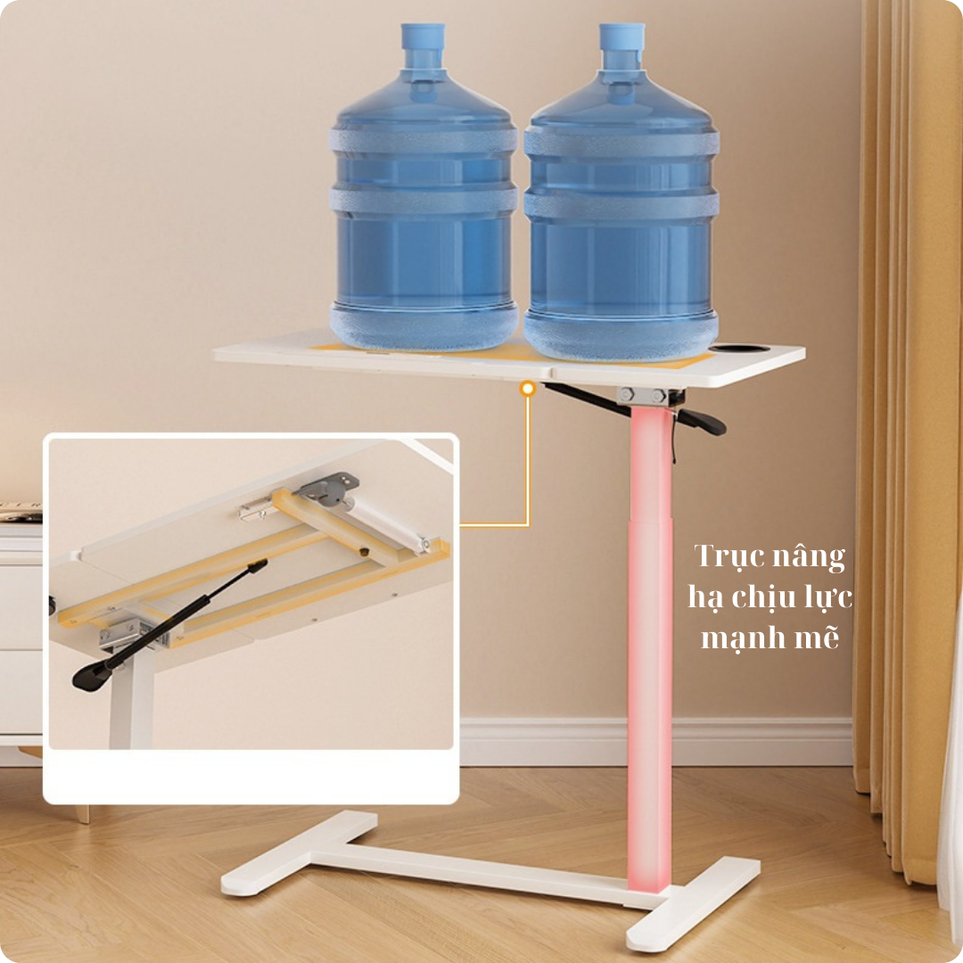 Bàn nâng hạ cạnh giường ngủ tại nhà, cạnh ghế sofa, mặt bàn có khả năng xếp gọn khi không dùng.