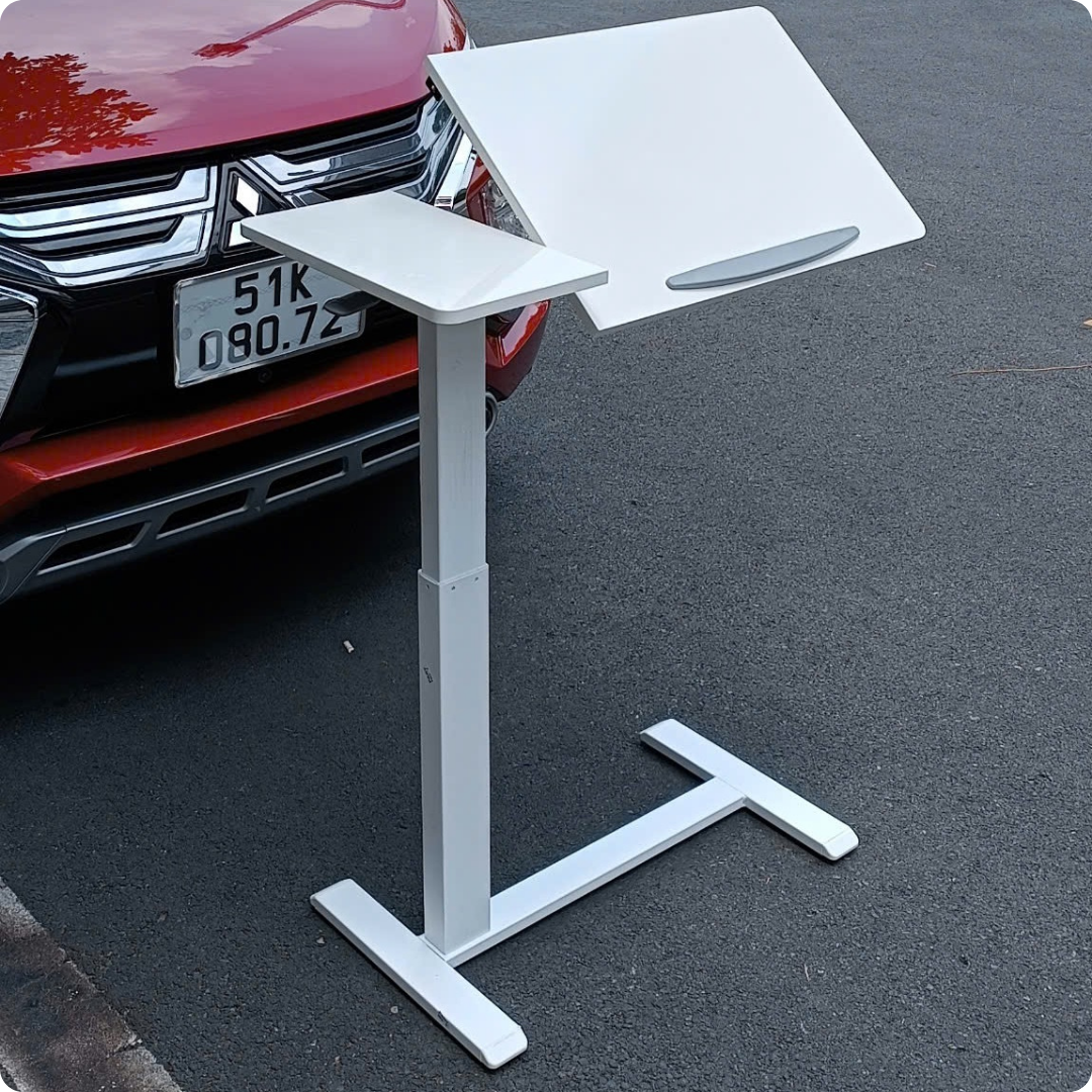 Bàn Laptop Nâng Hạ Chiều Cao thông minh. Có Bánh Xe Xoay 360 Độ. Mặt bàn có góc nghiêng. Thế hệ 2